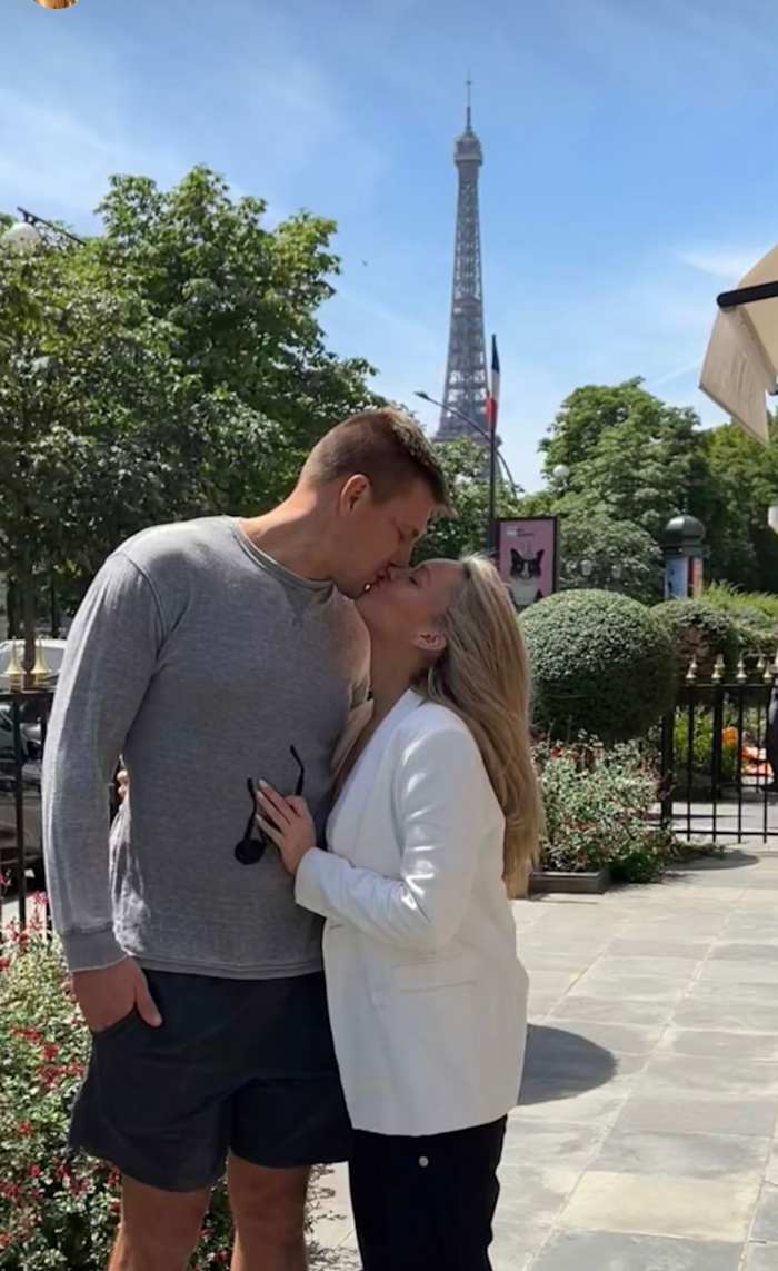 Camille Kostek and Rob Gronkowski in front of the Eiffel Tower in France.